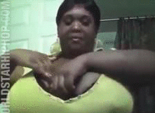 woman keys and vodka in bra